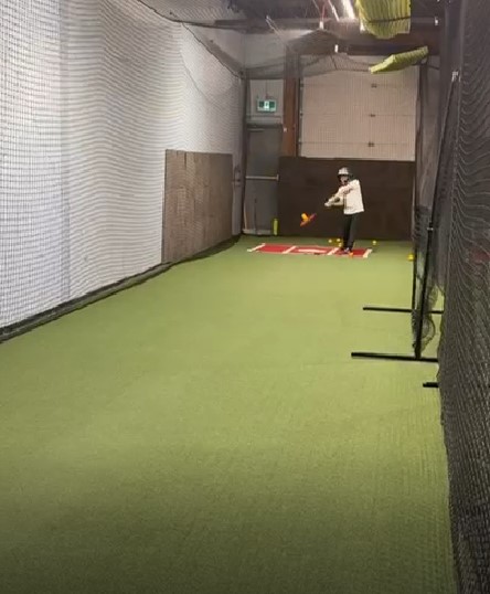 Indoor cricket cage with bowling machine at The Long Shot, Oakville